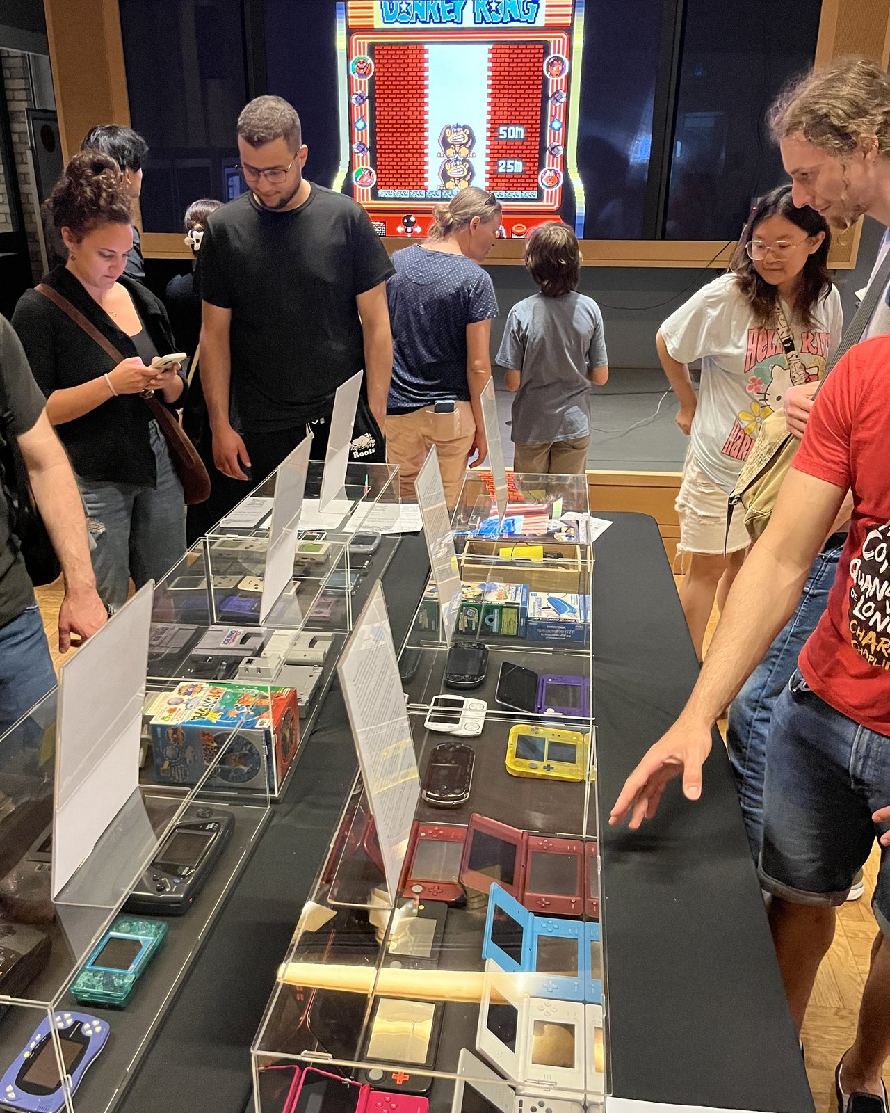 Visitors at the display cases